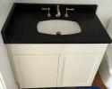 This is a small vanity that we made to go to St. Johns Island, SC. This door style is a 91 and it is painted Pure White. 