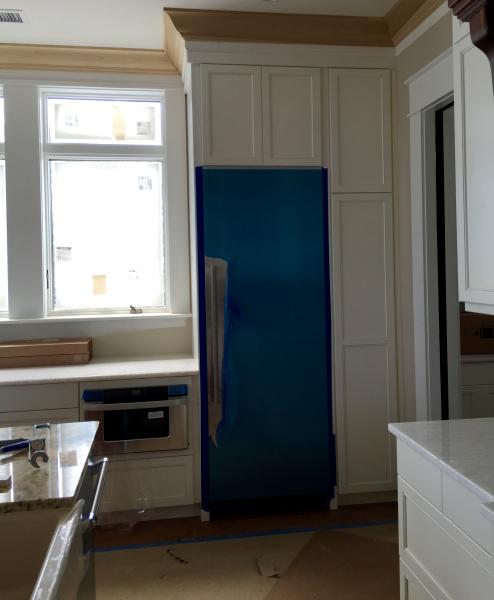 This is the kitchen perimeter cabinets. Door style is a number 91, and they are painted Pure White.