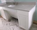This is an example of a handicap accessible bathroom vanity that we made fro St. Johns Island, SC. This is a number 91 door style and it is painted Pure White.