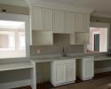 Here is a theater room that we made cabinets for in St. Johns Island, SC. The door style is a number 91 and it is painted Pure White.