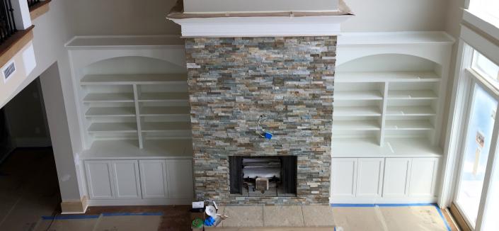 Here is the view from the 2nd story of the fireplace and cabinets. This is a number 91 door style painted pure white.