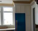 This is the kitchen perimeter cabinets. Door style is a number 91, and they are painted Pure White.